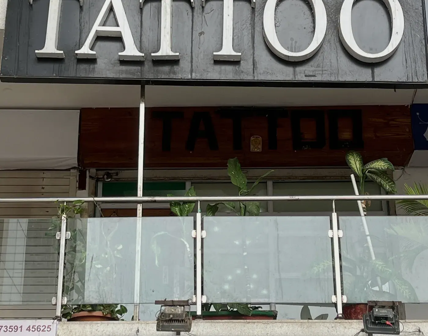 Ahmedabad Ink Tattoo storefront sign at Silver Square in Nikol